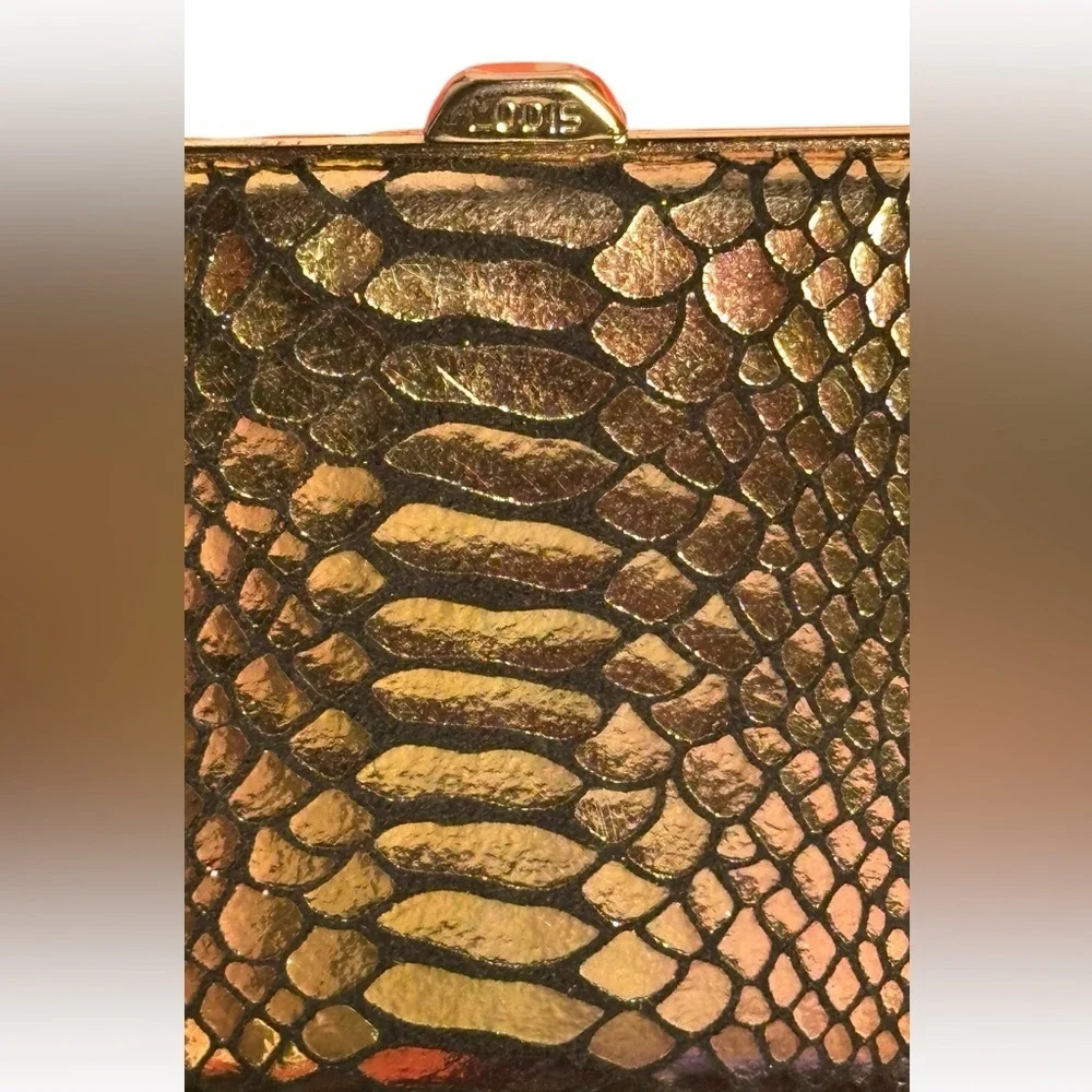 Lodis faux leather snake skin/ python print finish clutch purse.